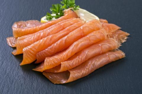Ready to eat cold-smoked or cured salmon is thinly sliced. The slices are an orange, pink or red colour and will feel slightly moist to touch.